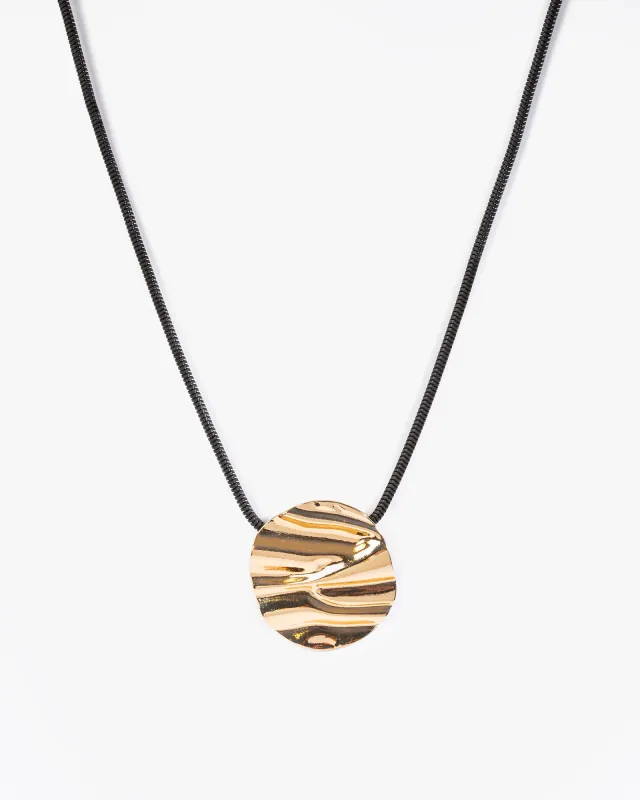 Gold Crumpled Metal Pendant Cord Necklace sold by Collete Hayman