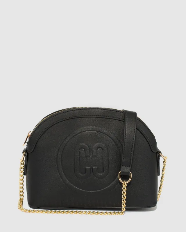 Black Raina Embossed Crossbody Bag sold by Collete Hayman