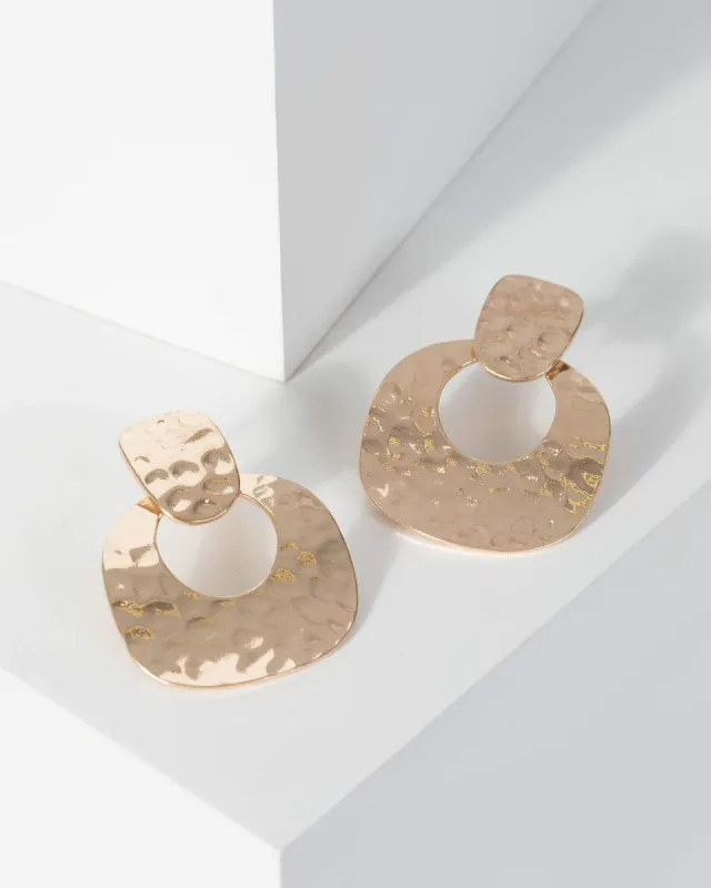 Gold Metal Textured Door Knocker Earrings sold by Collete Hayman