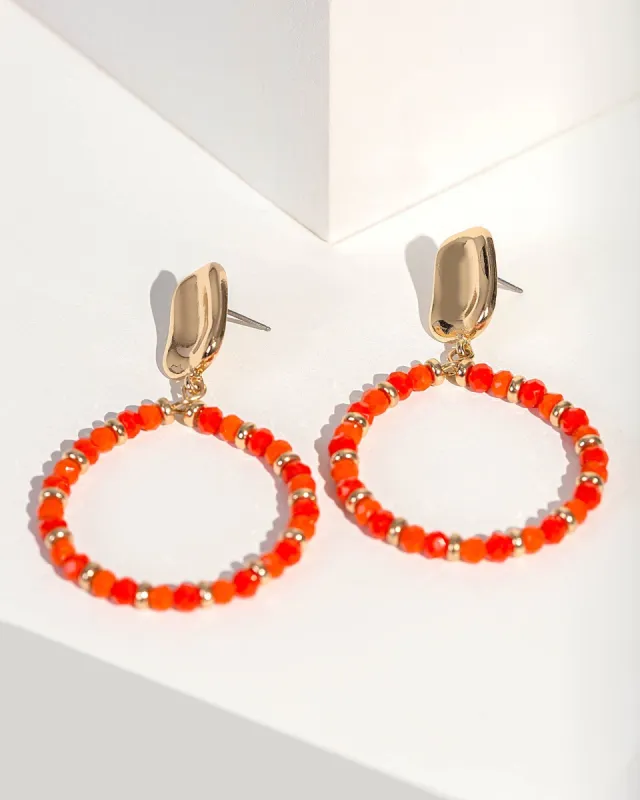 Orange Beaded Circle Drop Earrings sold by Collete Hayman