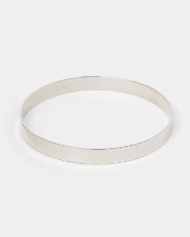 Silver Thick Metal Bangle Bracelet sold by Collete Hayman