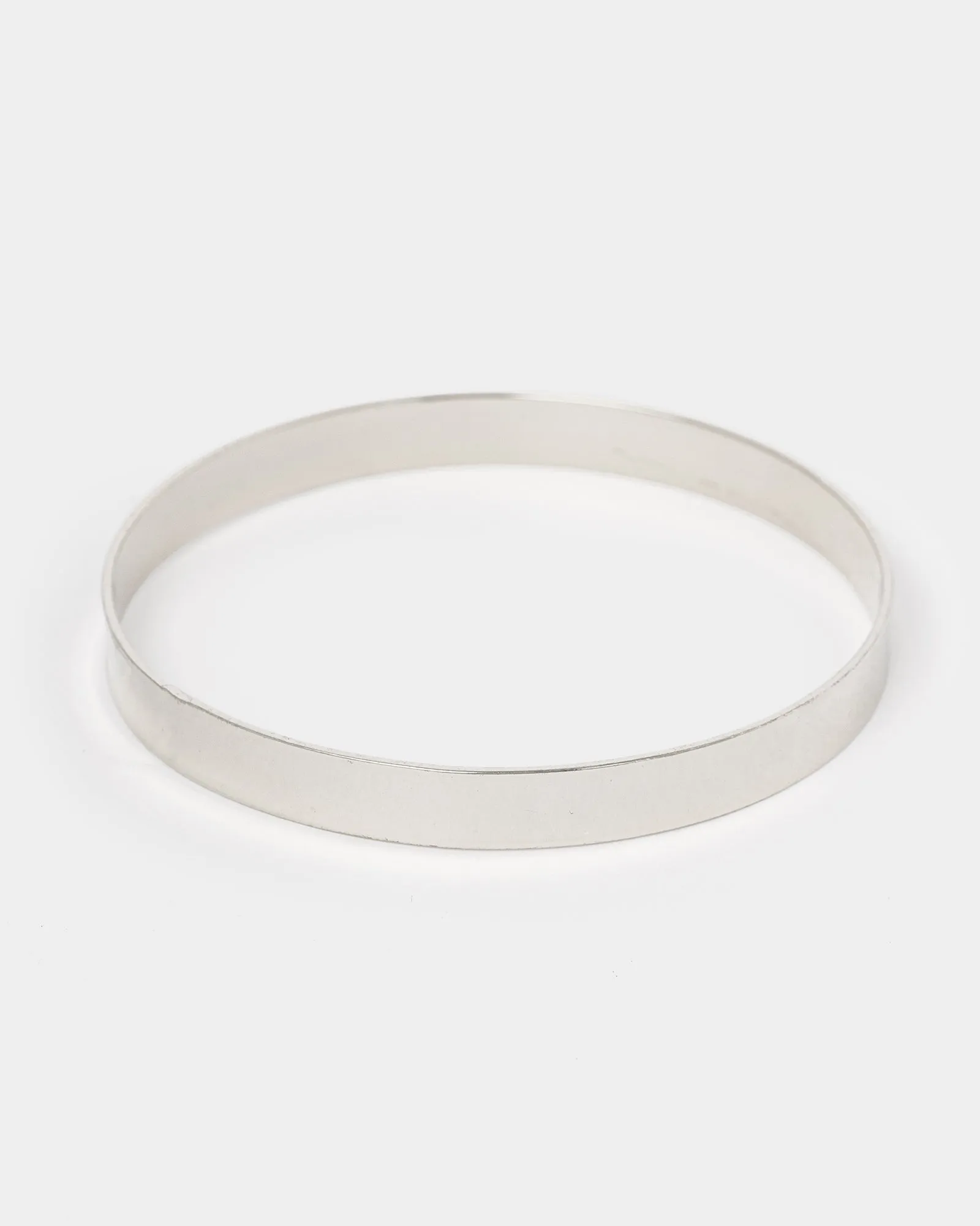 Silver Thick Metal Bangle Bracelet sold by Collete Hayman