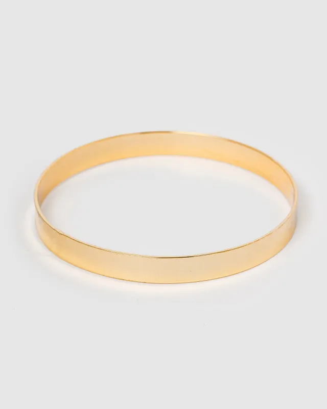 Gold Thick Metal Bangle Bracelet sold by Collete Hayman