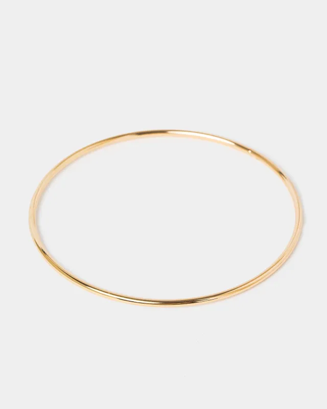 Gold Thin Metal Bangle Bracelet sold by Collete Hayman
