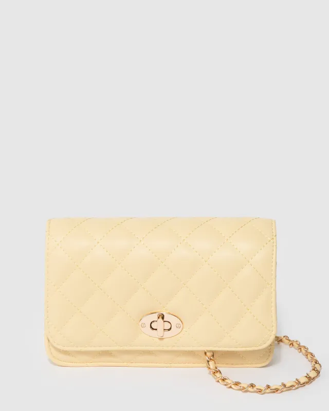 Yellow Ebony Lock Crossbody Bag sold by Collete Hayman