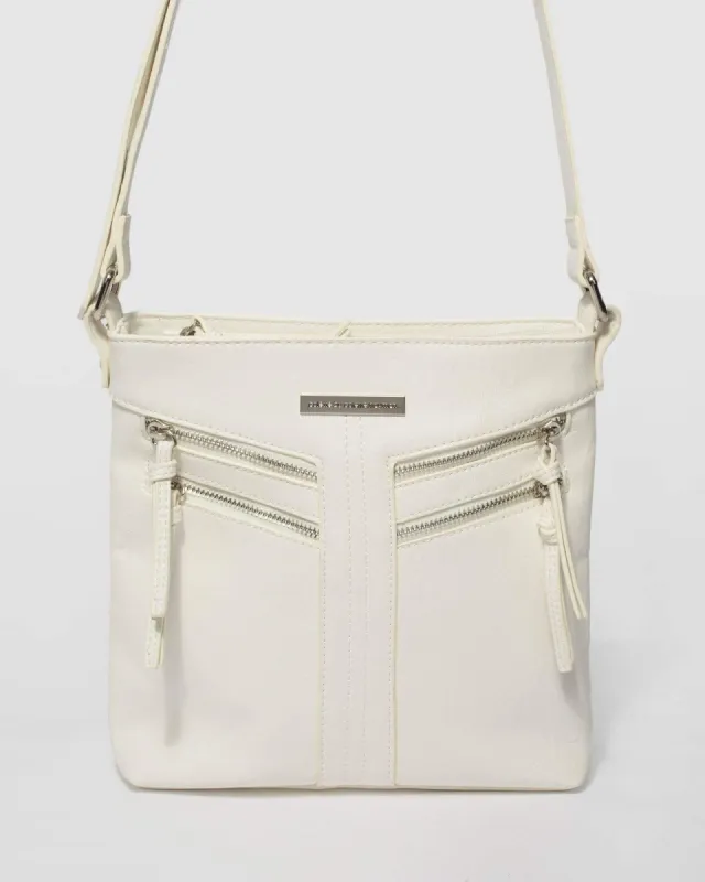 White Dahlila Zipper Crossbody Bag sold by Collete Hayman