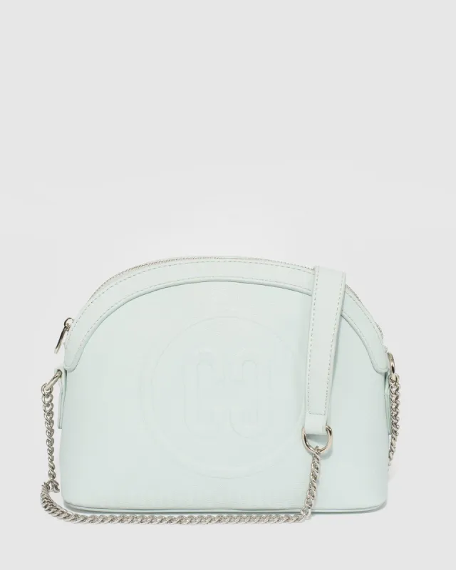 Blue Raina Embossed Crossbody Bag sold by Collete Hayman