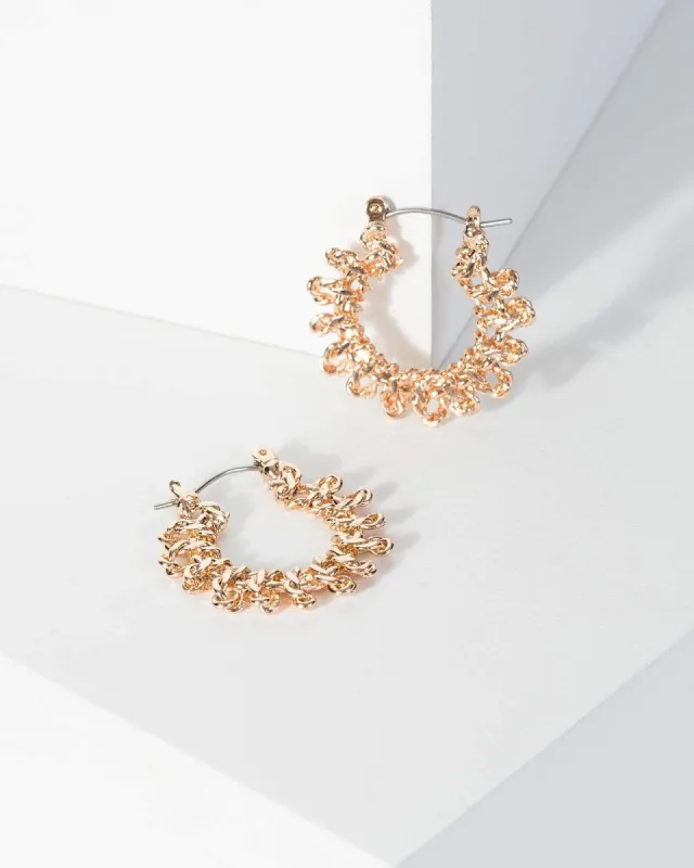 Gold Textured Mid Hoop Earrings sold by Collete Hayman
