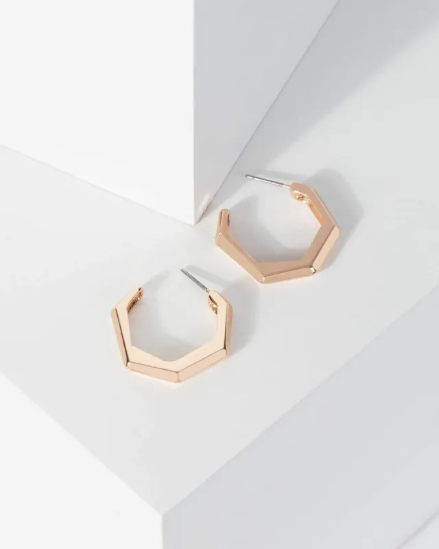 Gold Dimensional Shape Hoop Earrings sold by Collete Hayman