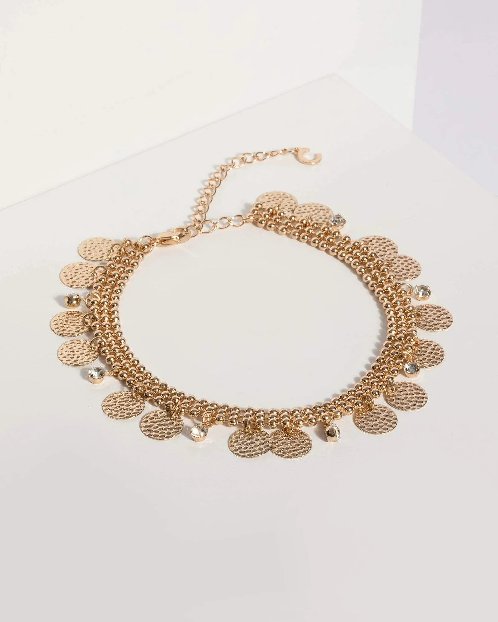 Gold Hammered Disc Bracelet sold by Collete Hayman