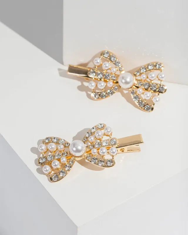 Gold 2 Pack Pearl And Crystal Bow Hair Slides sold by Collete Hayman