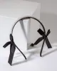 Black Side Bow Detailing Pearl Headband sold by Collete Hayman