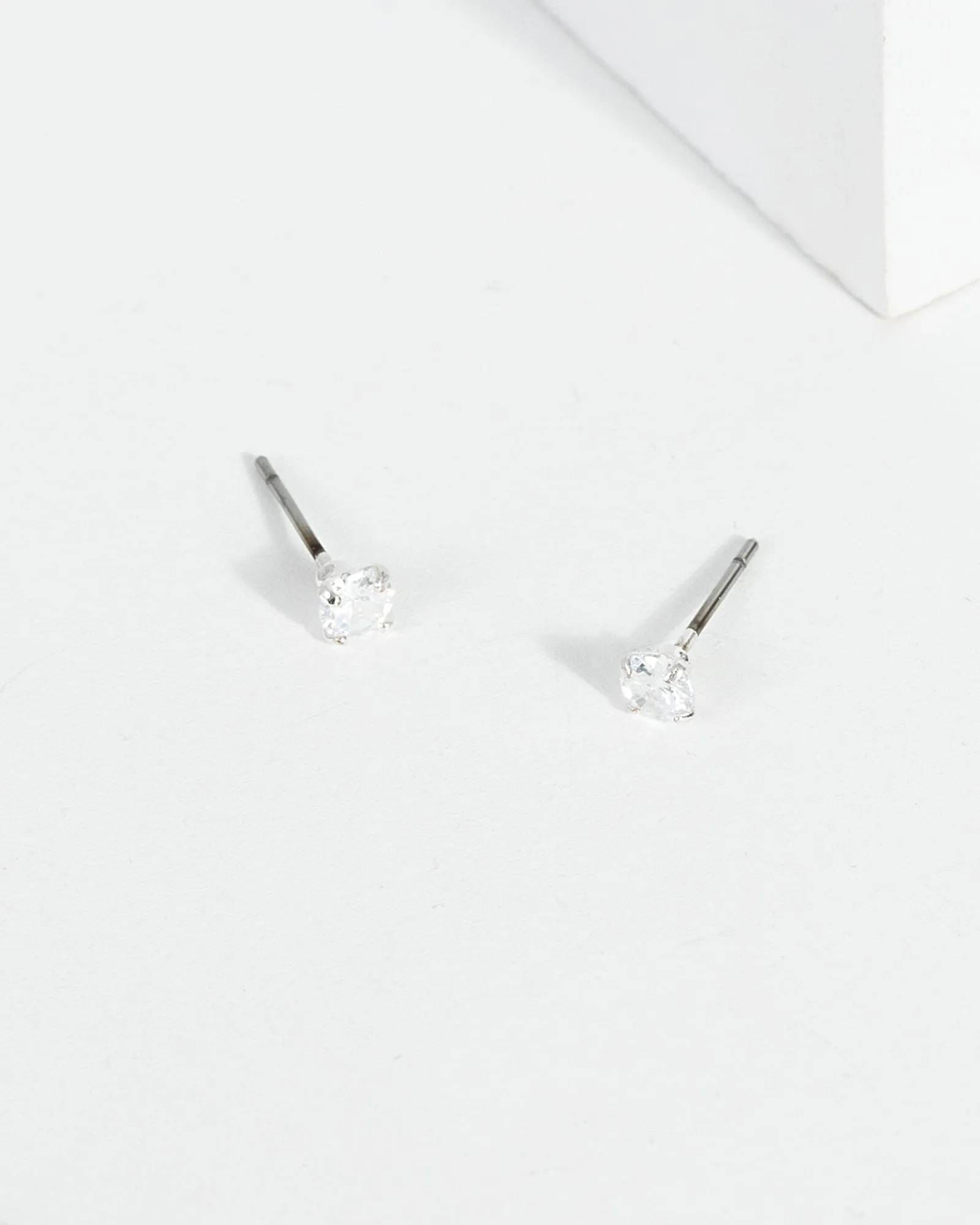 Silver 4mm Cubic Zirconia Round Low Set Stud Earrings sold by Collete Hayman