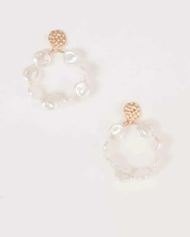 Gold Hammered Pearl Hoop Earrings sold by Collete Hayman