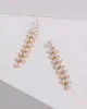 Gold Teardrop Diamante Drop Earrings sold by Collete Hayman