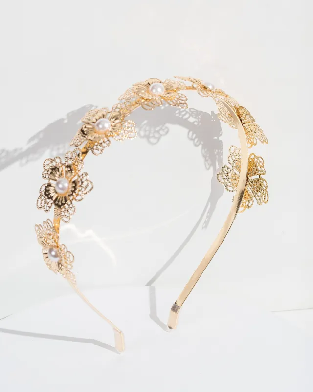 Gold And Pearl Flower Headband sold by Collete Hayman