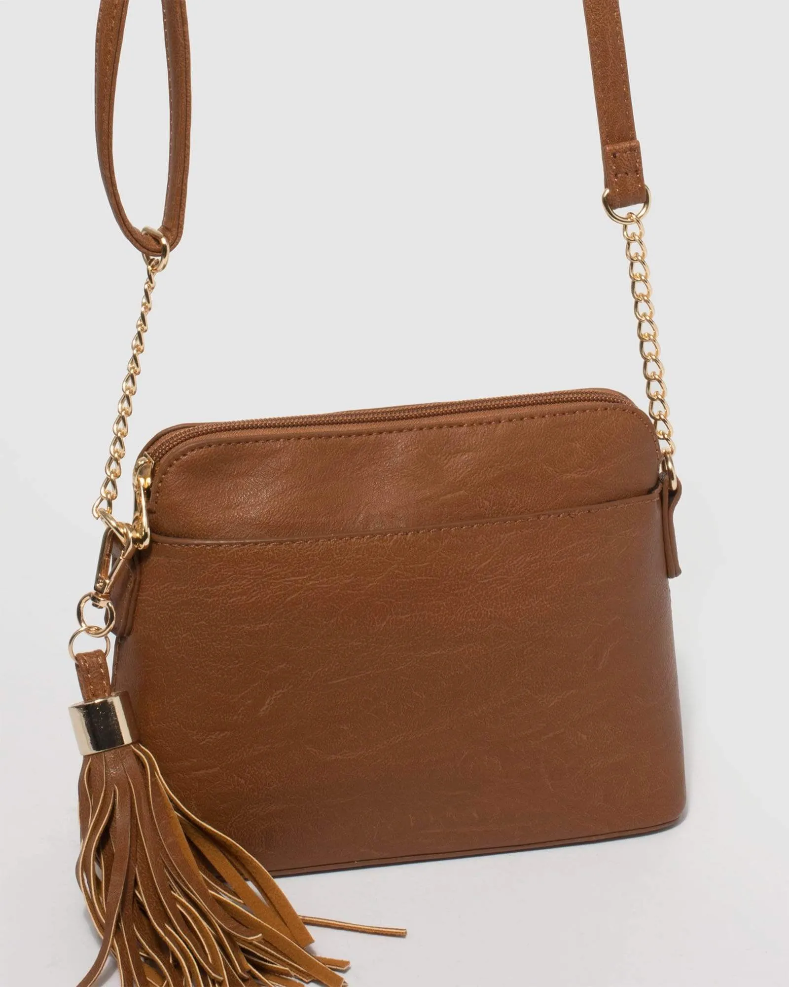 Tan Karen Tassel Crossbody Bag sold by Collete Hayman