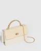 Nude Nynke Spring Handle Bag sold by Collete Hayman