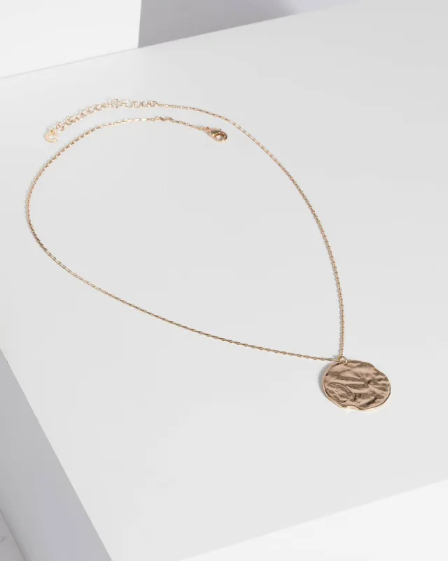 Gold Organic Disc Drop Necklace sold by Collete Hayman