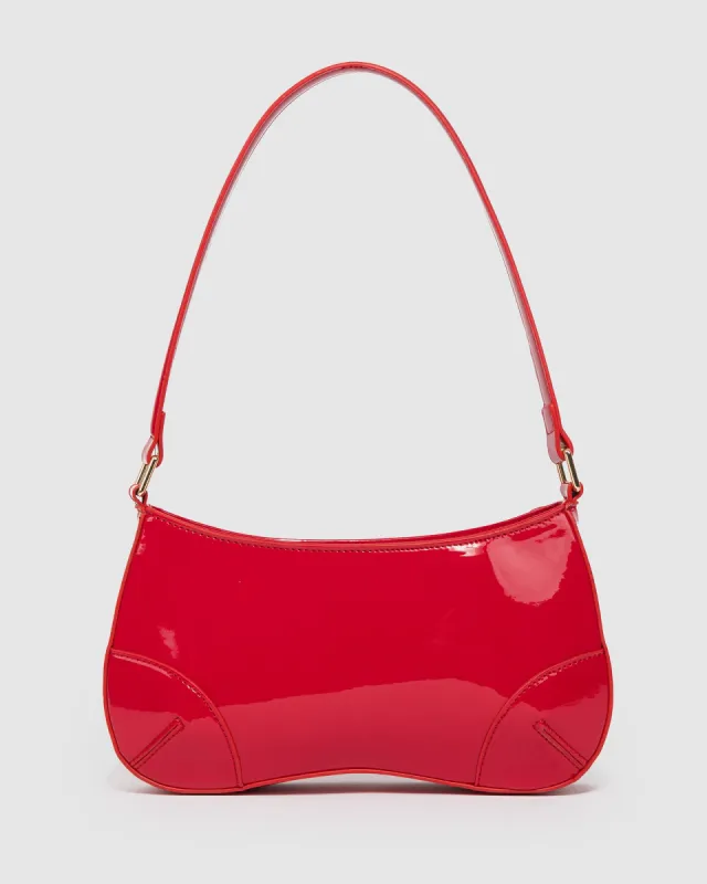 Red Calliope Curved Shoulder Bag sold by Collete Hayman
