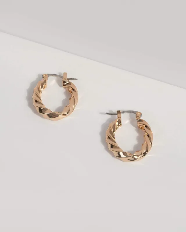 Gold Metal Twist Hoop Earrings sold by Collete Hayman