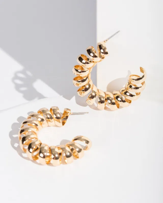 Gold Swirled Hoop Earrings sold by Collete Hayman