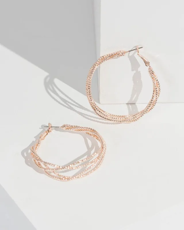 Rose Gold Intertwined Hoop Earrings sold by Collete Hayman