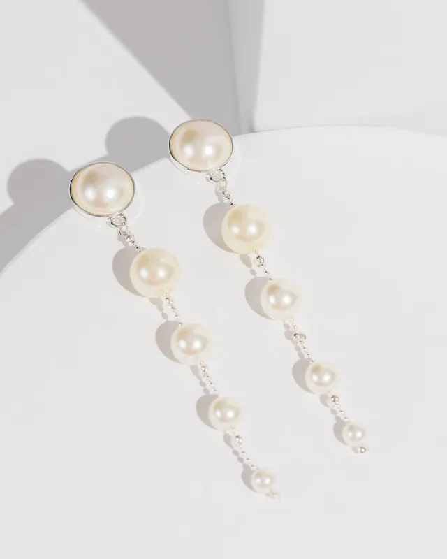 White Big To Small Pearly Drop Earrings sold by Collete Hayman