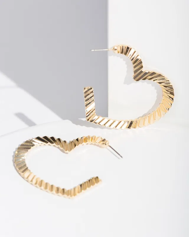 Gold Textured Big Heart Hoop Earrings sold by Collete Hayman