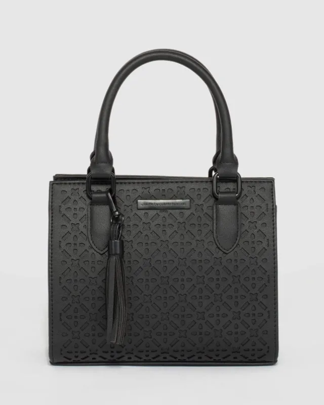 Black Sia Punchout Mini Bag sold by Collete Hayman