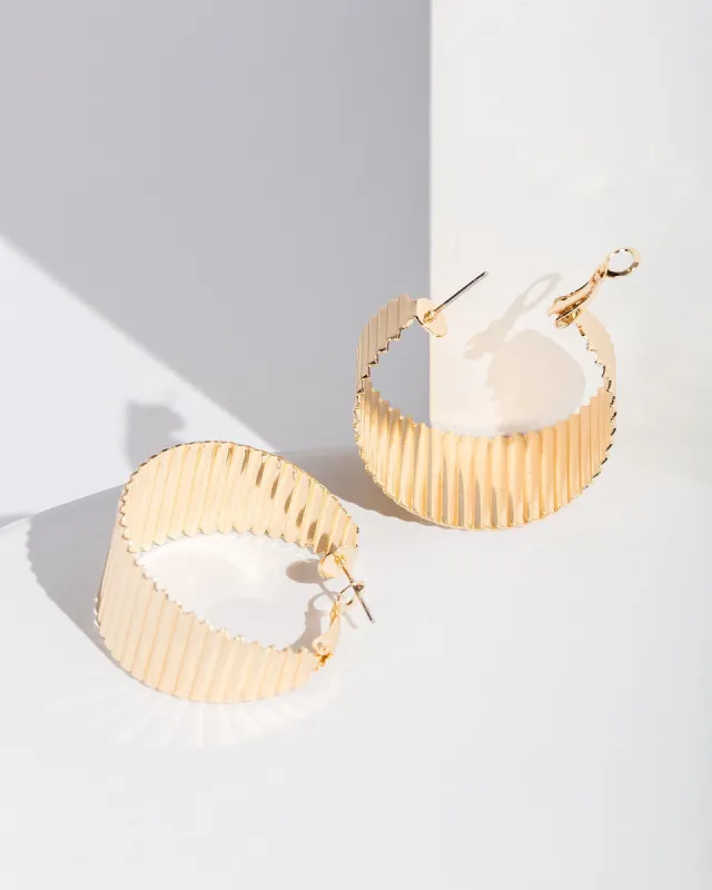 Gold Textured Wide Hoop Earrings sold by Collete Hayman