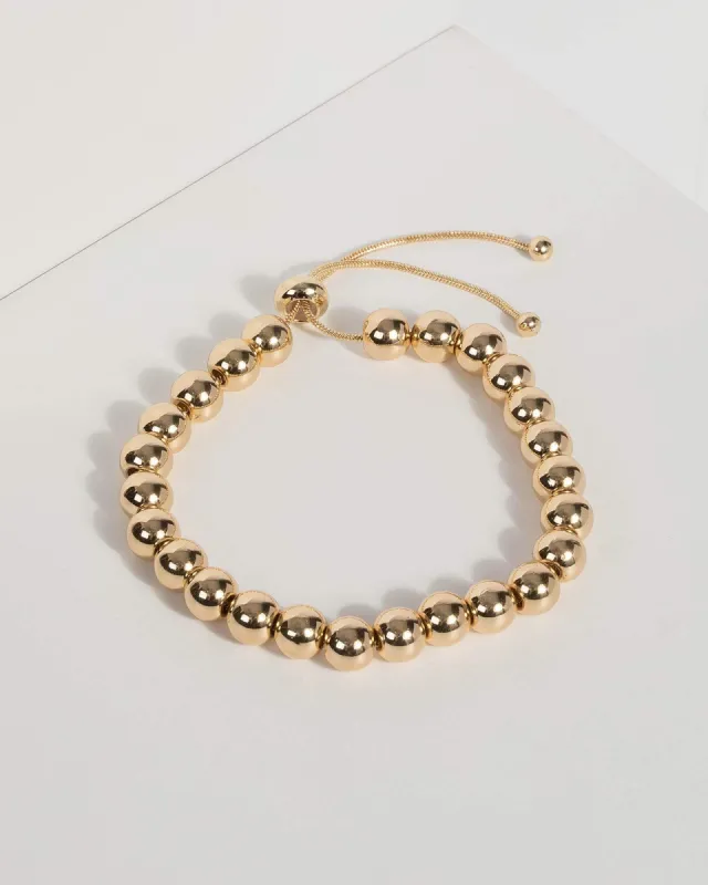 Gold Round Ball Statement Bracelet sold by Collete Hayman