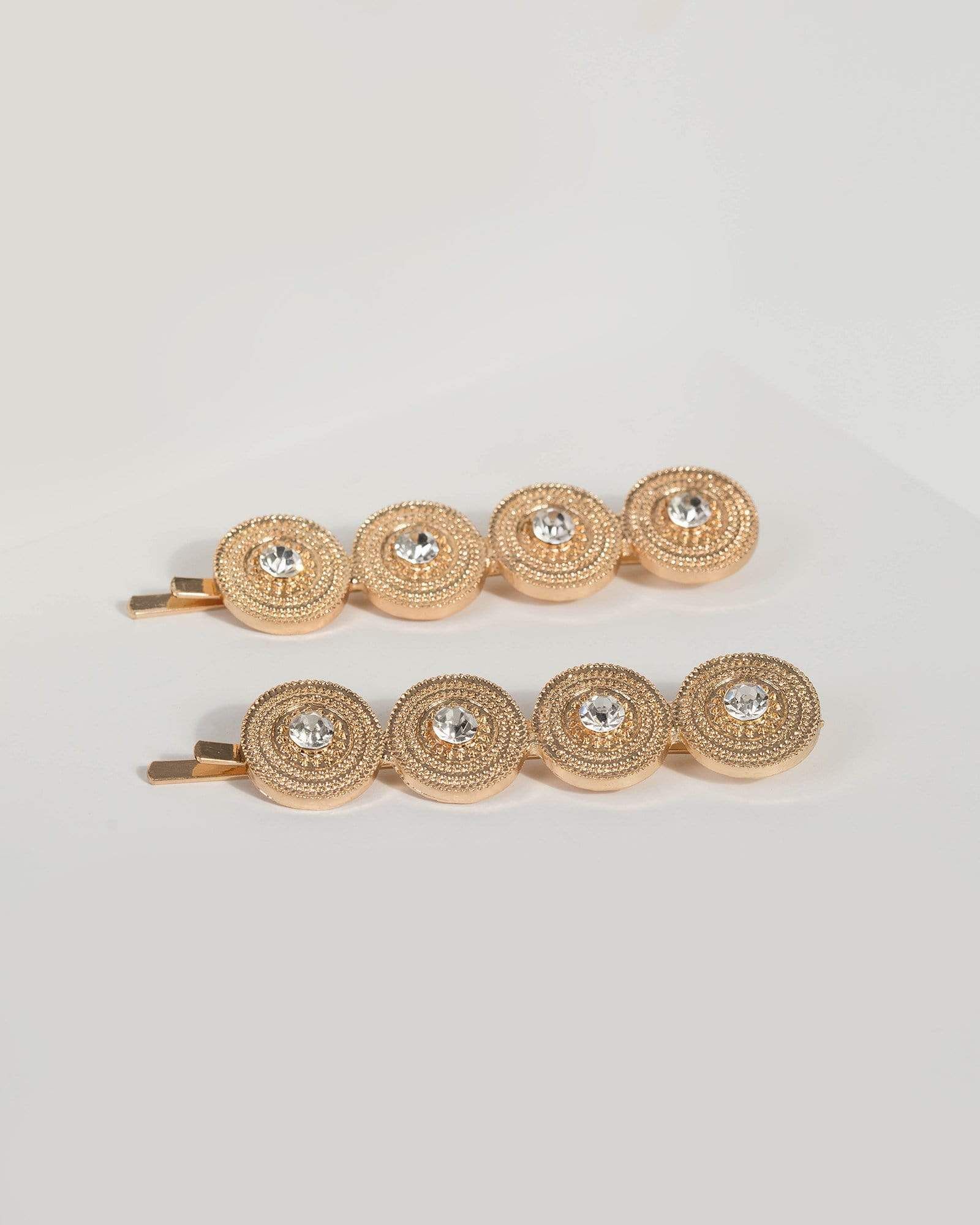 Gold Multi Disc Hair Slides sold by Collete Hayman