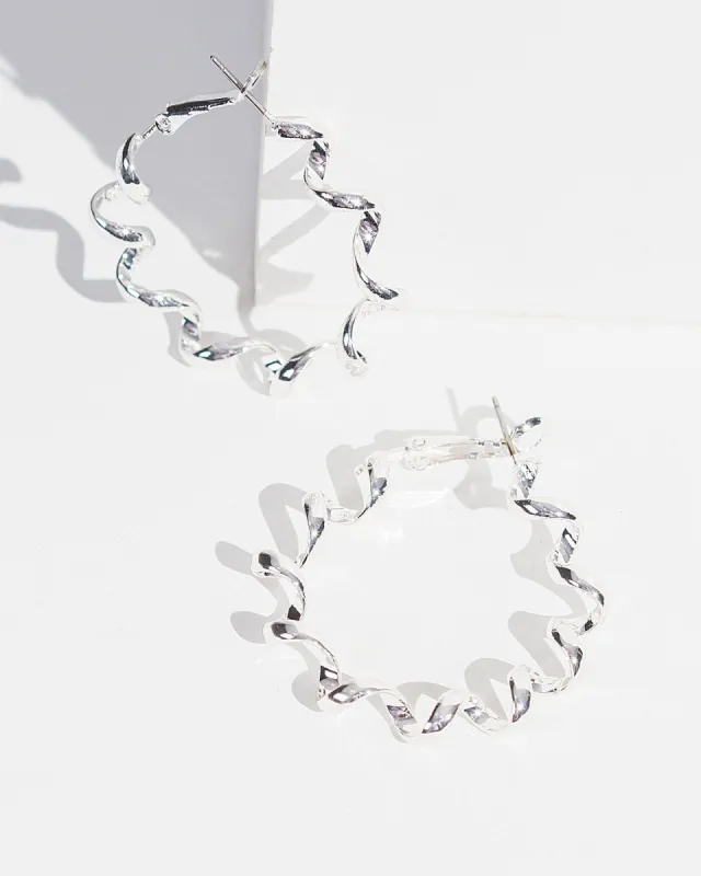 Silver Spiral Hoop Earrings sold by Collete Hayman