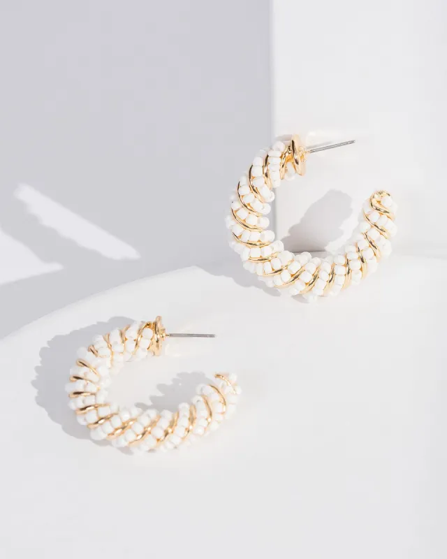White Bead Wrapped Chunky Hoop Earrings sold by Collete Hayman