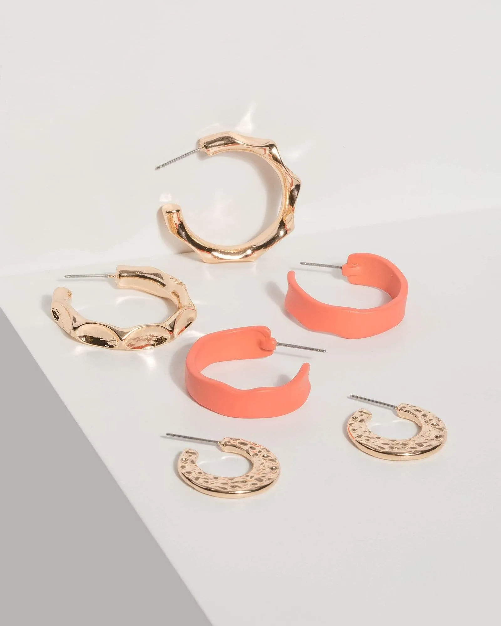 Gold Hammered Hoop Earrings sold by Collete Hayman