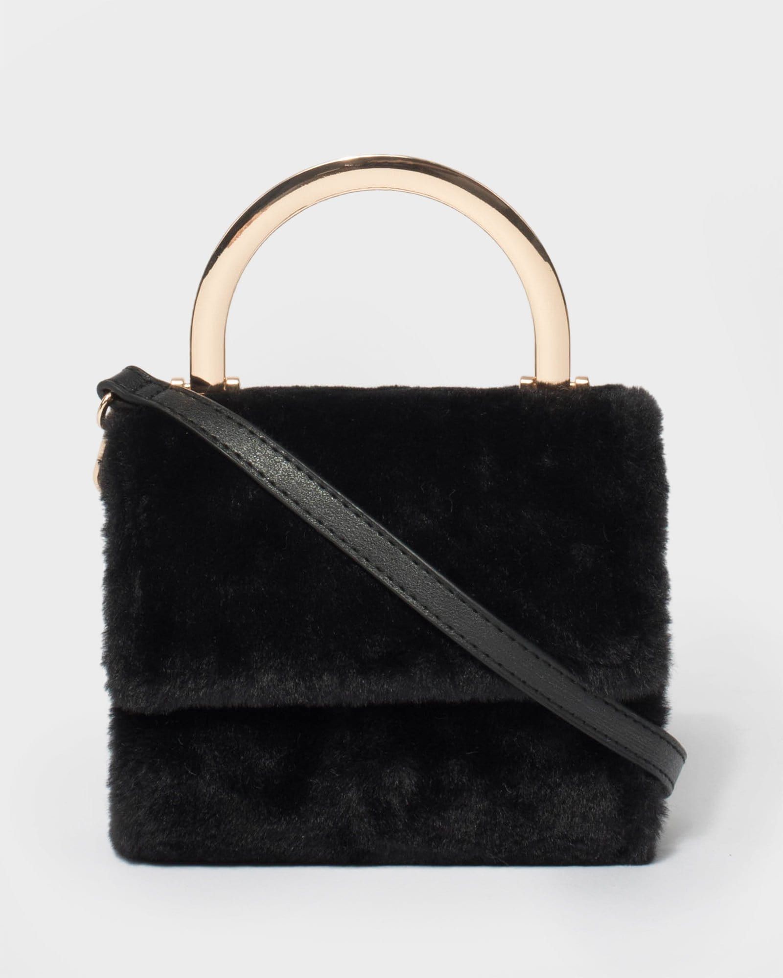 Black Soft Mini Top Handle Bag sold by Collete Hayman
