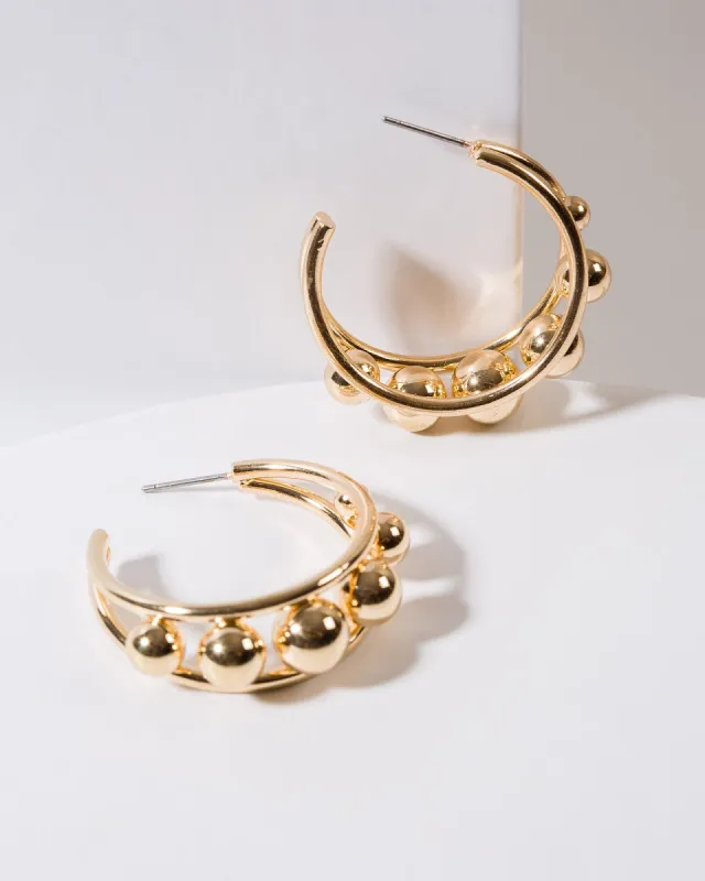 Gold Multi Sphere Hoop Earrings sold by Collete Hayman