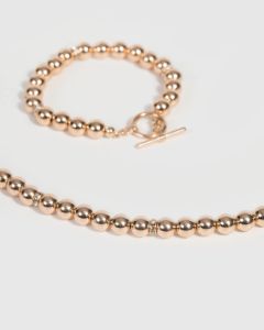Gold Beaded Necklace and Bracelet Set sold by Collete Hayman