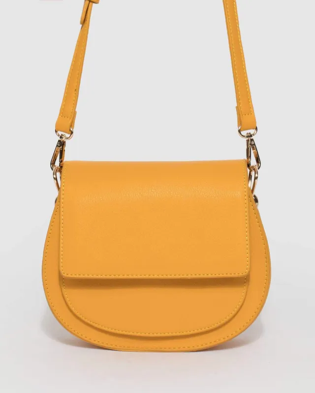 Mustard Halsey Saddle Bag sold by Collete Hayman