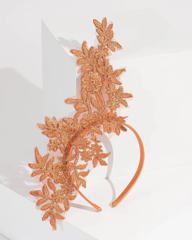 Rose Gold Tall Flower Fascinator sold by Collete Hayman