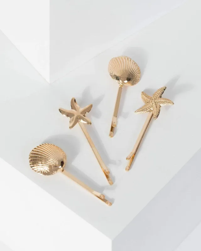 Gold 4 Pack Starfish And Shell Hair Slides sold by Collete Hayman