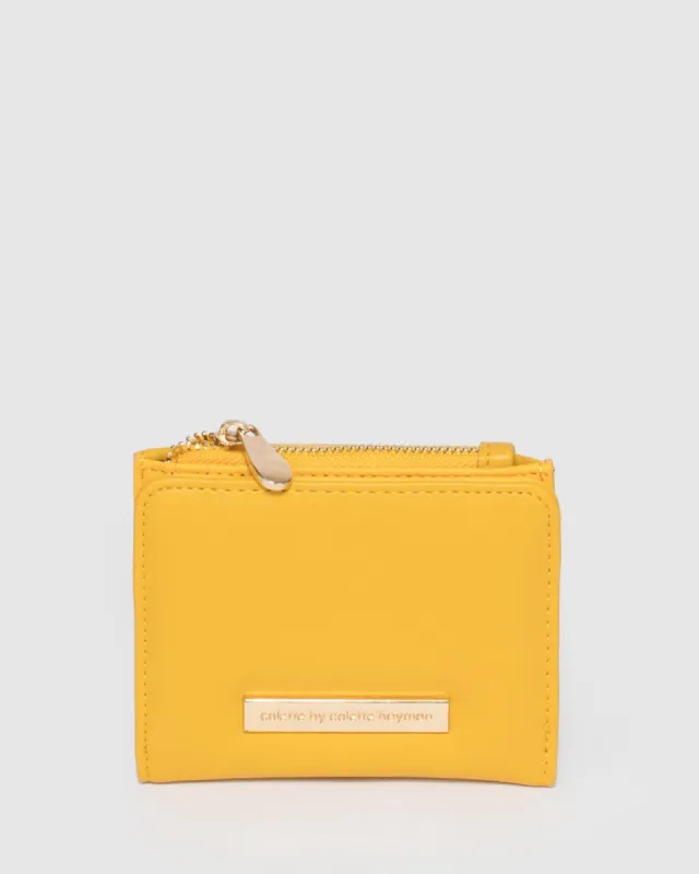 Mustard Han Mini Wallet sold by Collete Hayman