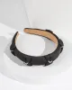 Black Multi Crystal Bow Headband sold by Collete Hayman