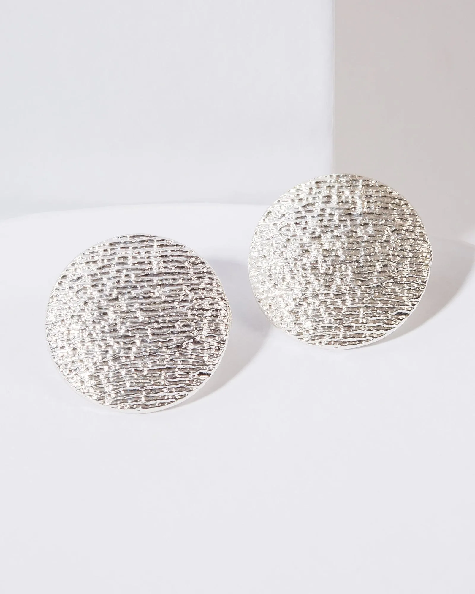 Silver Textured Round Clip On Earrings sold by Collete Hayman