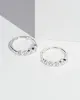Crystal Huggie Hoop Earrings sold by Collete Hayman