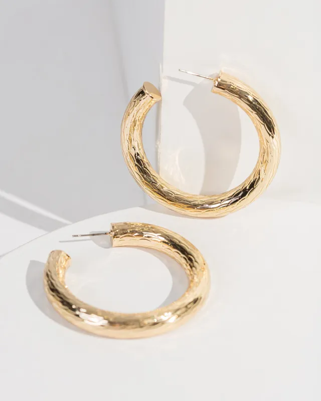 Gold Textured Chunky Hoop Earrings sold by Collete Hayman