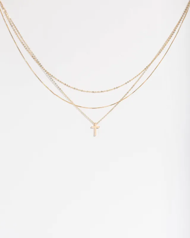 Gold Cross Pendant Necklace sold by Collete Hayman
