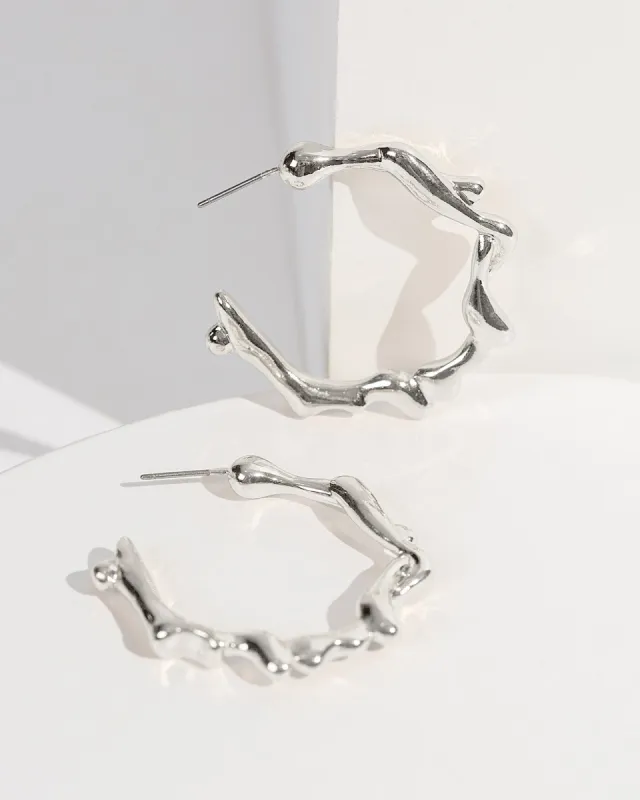 Silver Twisted Thin Hoops Earrings sold by Collete Hayman