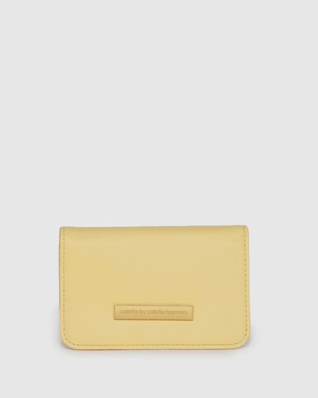 Yellow Lulu Logo Purse sold by Collete Hayman